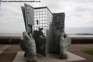 The marker at the start of the coast path